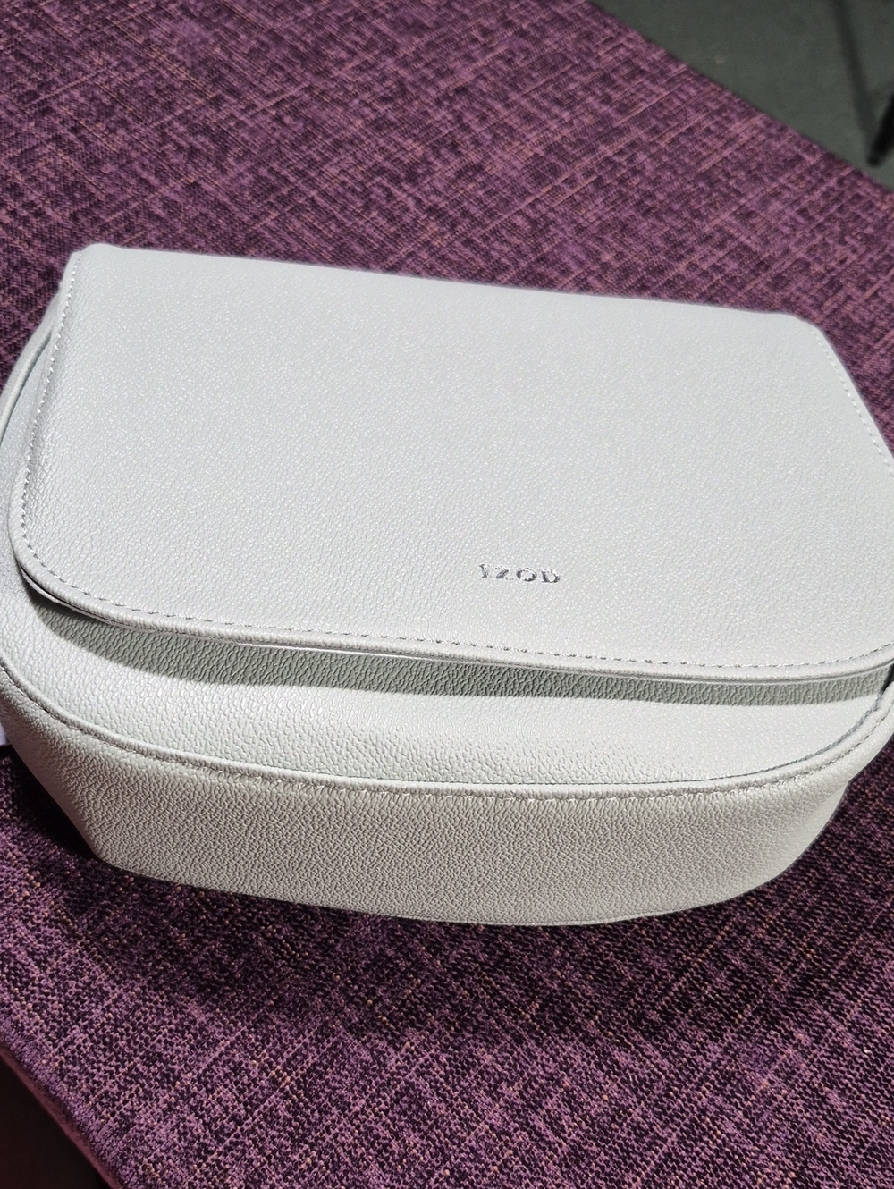 Izod Sage Pebble-Texture Crossbody Saddle Bag